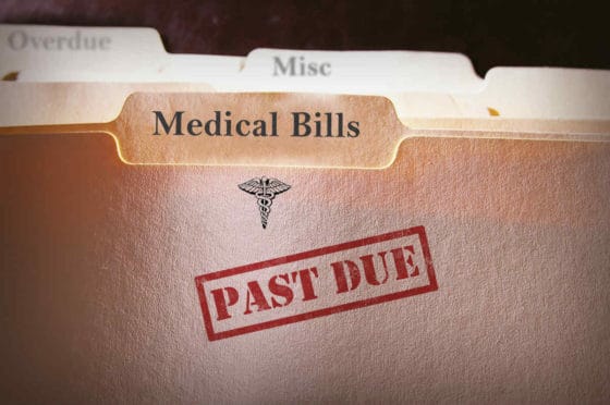 folder containing medical bills past due