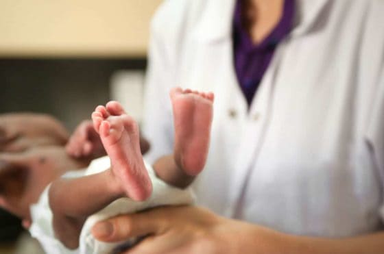 chicago nurse holding newborn